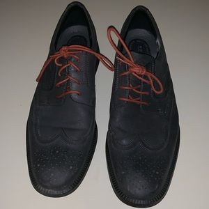 Gray Rockport wingtip lace-up dress shoes